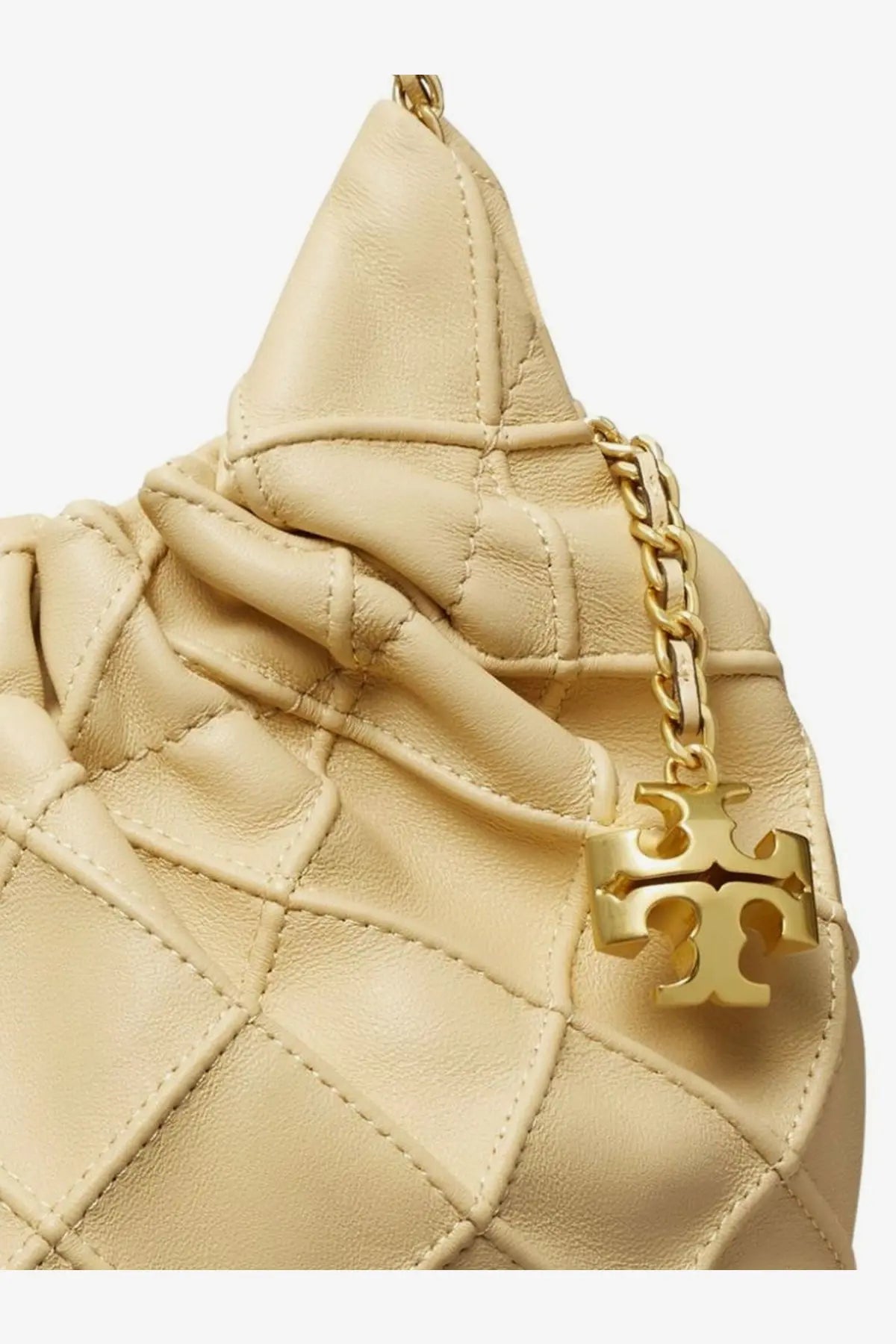 Beige quilted leather Tory Burch women’s Fleming mini hobo bag with gold-tone chain and logo charm