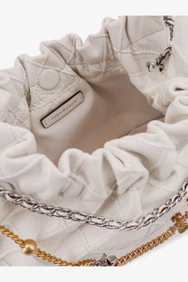 Tory Burch women’s Fleming mini hobo white quilted leather bucket bag with silver chain strap and gold-tone hardware