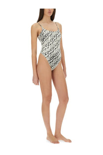 Tory Burch women’s Gemini Link one piece swimsuit in white with black and white snake print and thin spaghetti straps