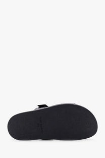 Black rubber sole with minimalist design and tommy hilfiger branding on tory burch womens ines leather grey sandals
