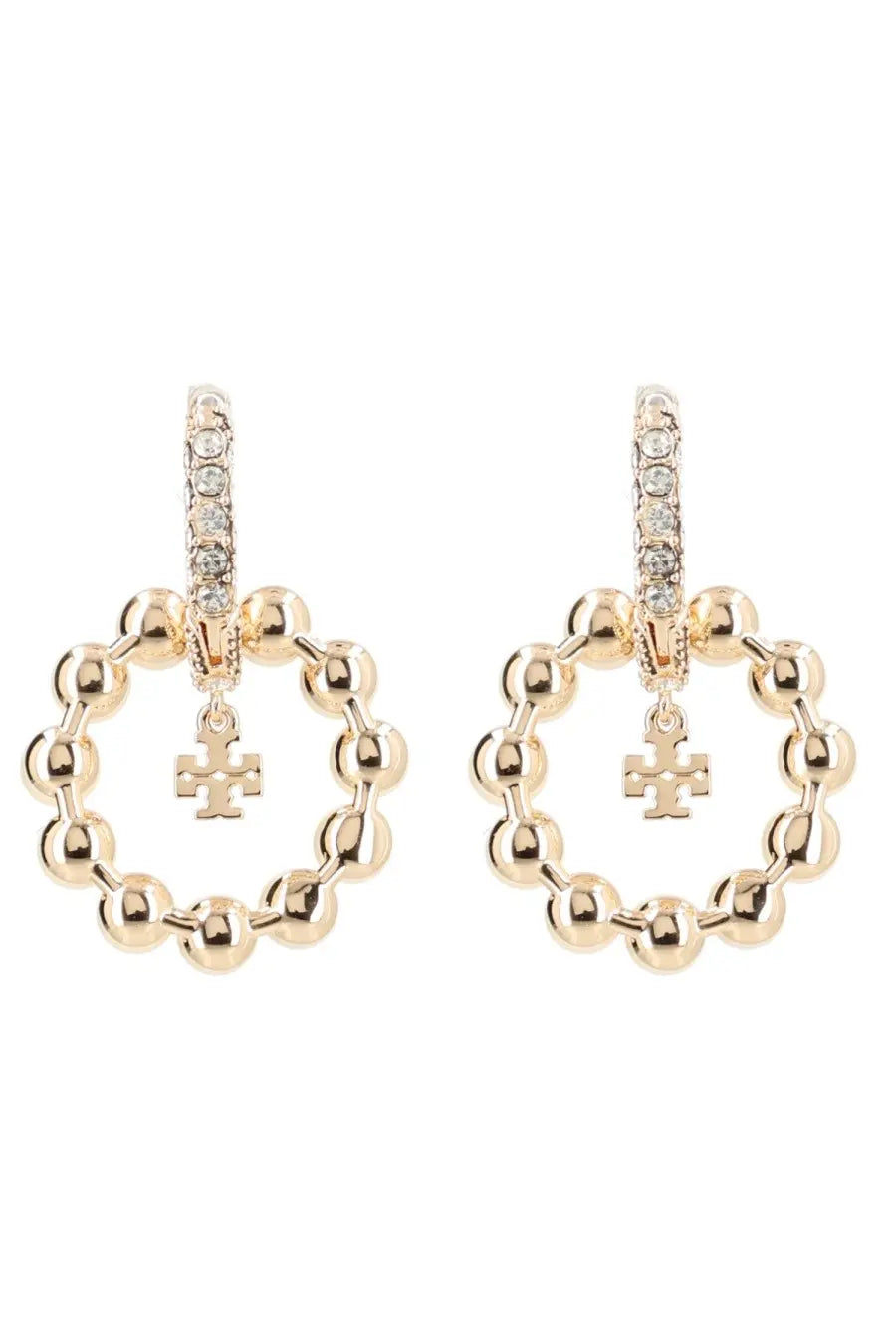 Gold-toned Tory Burch women’s Kira earrings with beaded hoops, crystal posts, and dangling cross charms in white