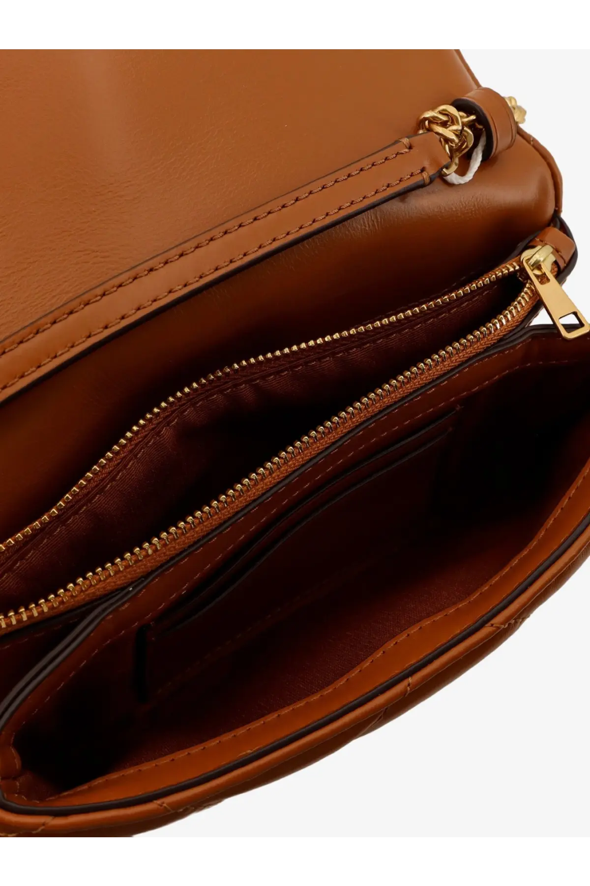 Tan leather crossbody bag with gold-tone zipper and chain strap detail from Tory Burch women’s Kira Matelassé collection