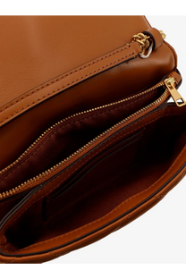 Tan leather crossbody bag with gold-tone zipper and chain strap detail from Tory Burch women’s Kira Matelassé collection
