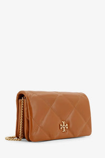 Tan quilted leather crossbody bag with gold chain strap and logo clasp by Tory Burch women’s Kira Matelassé collection