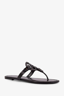 Black Tory Burch women’s leather thong sandal with glossy finish and signature logo strap in brown color