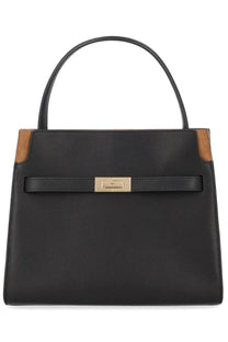 Tory Burch women’s Lee Radziwill small black leather tote bag with tan accents and gold-tone clasp
