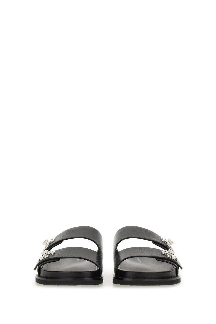 Tory Burch women’s black leather lock sandal with silver-toned buckle accents for stylish casual wear