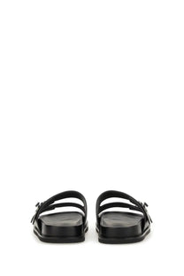 Tory Burch women’s lock sandal black leather slide sandals with minimalist design and metallic buckle accents