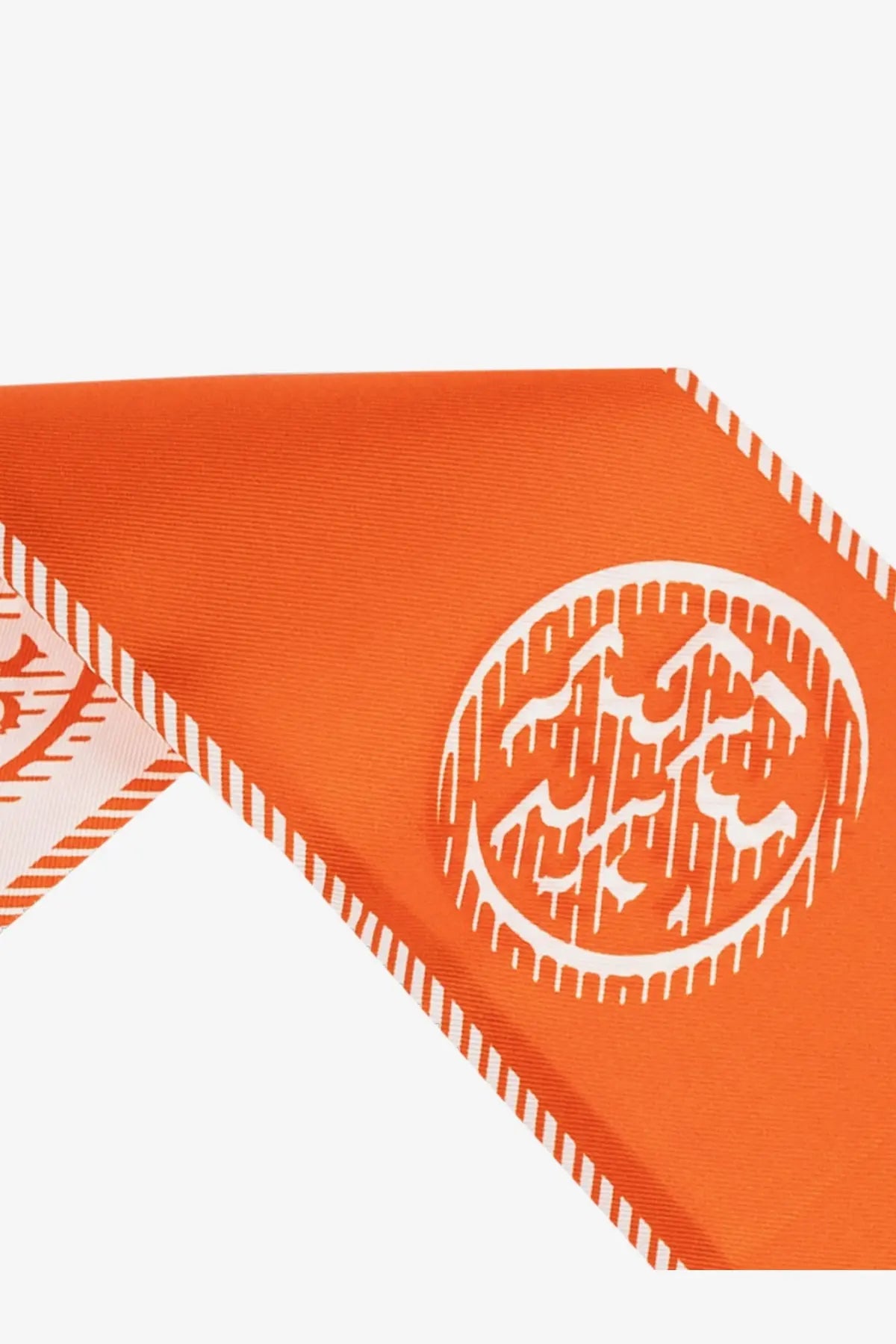 Tory burch women’s medallion ribbon silk tie grey featuring a bright orange silk scarf with a bold white geometric emblem