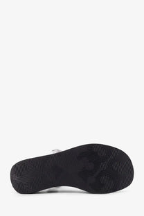 Tory Burch women’s mellow leather wedge sandal in blue with silver metallic upper and black rubber sole with geometric tread