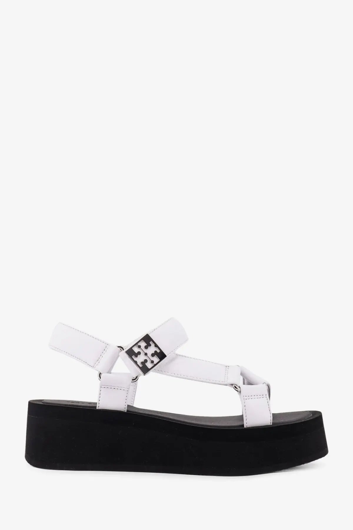Tory Burch women’s white leather platform sandal with black sole and silver-toned logo buckle