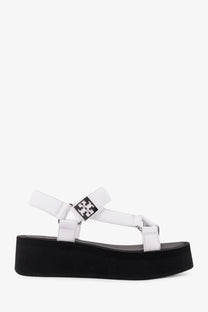 Tory Burch women’s white leather platform sandal with black sole and silver-toned logo buckle