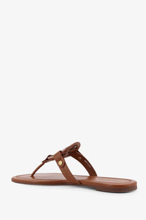 Tory Burch women’s miller leather thong sandal in beige with brown braided strap and gold-tone circular buckle