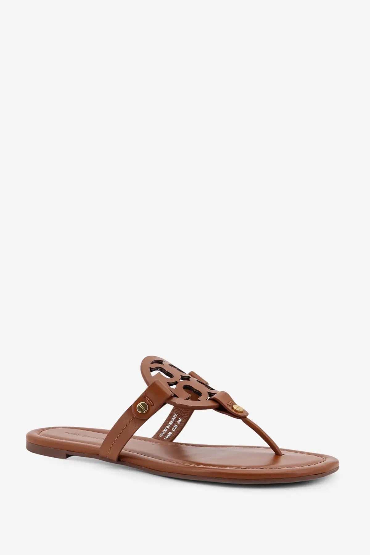 Tory Burch women’s beige leather thong sandals with distinctive brown circular logo detail