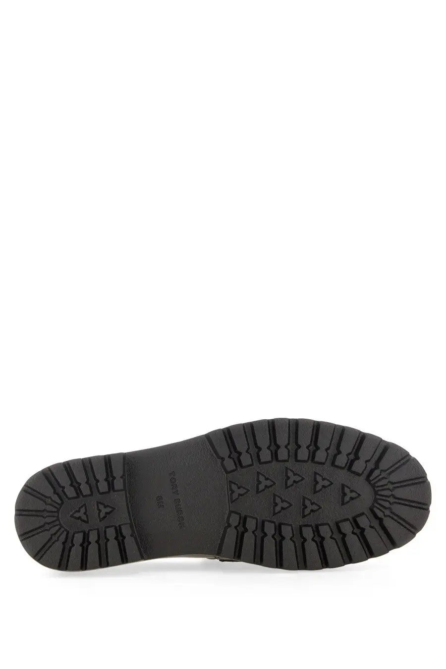 Tory Burch women’s mocassino classico black showing a black rubber sole with rugged textured tread and triangular grip markings