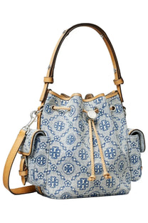 Tory Burch women’s monogram bucket bag in light blue denim with navy logo print tan leather handles and drawstring closure