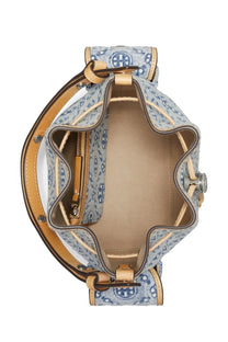 Tory burch women’s monogram bucket bag in blue and white patterned denim with tan leather trim