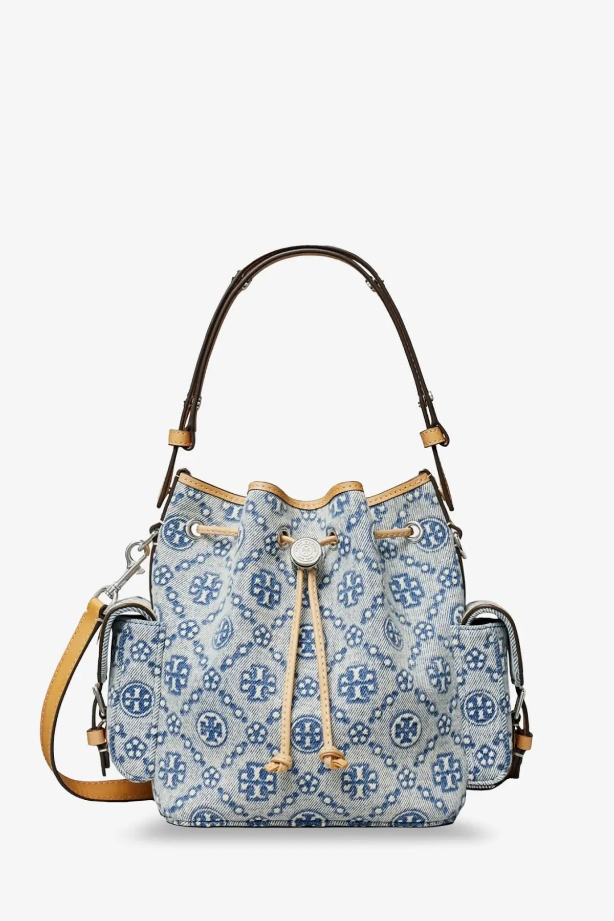 Tory Burch women’s monogram coated canvas bucket bag in blue with white pattern and brown leather handles and trim