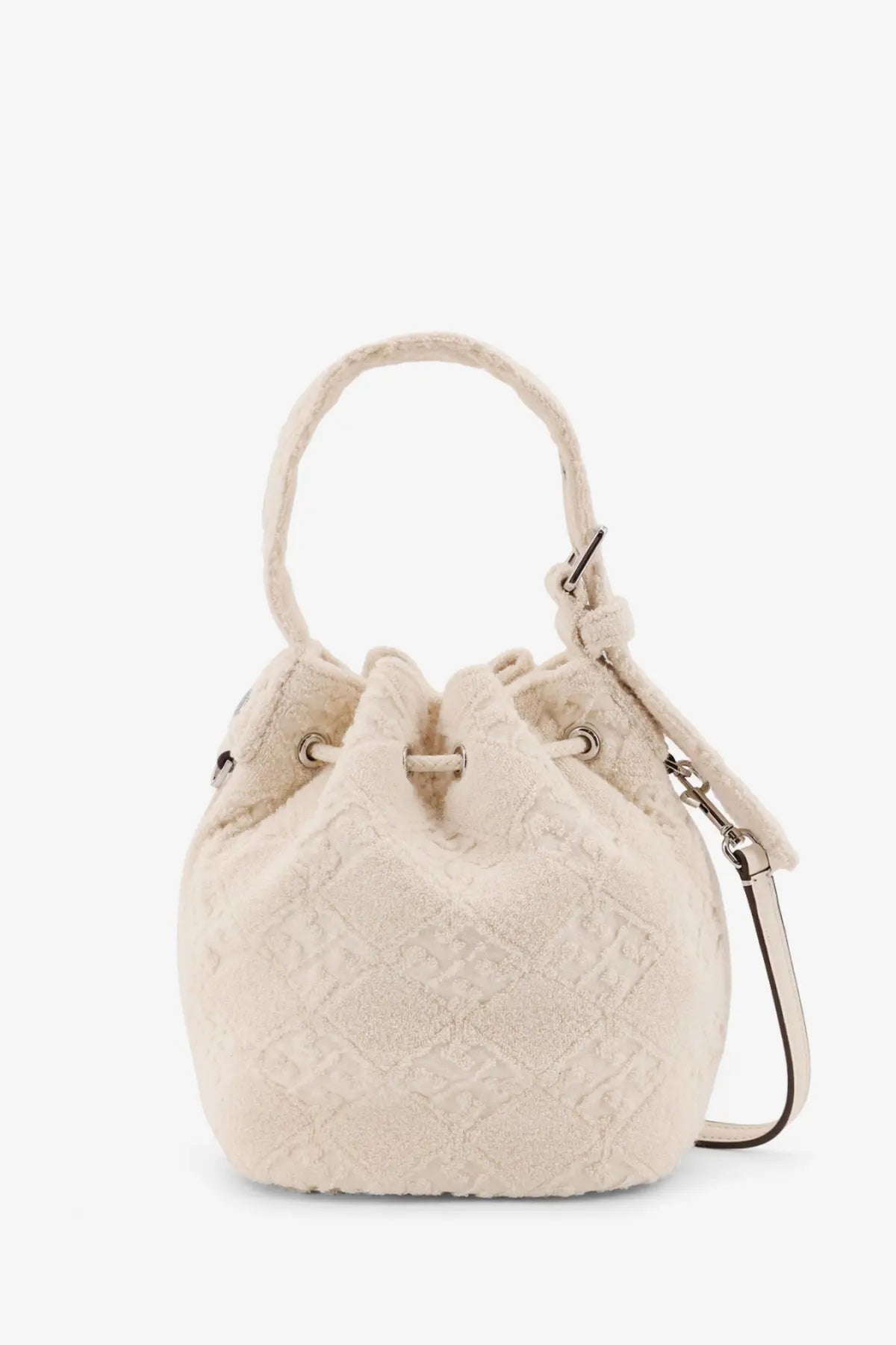 Cream-colored tory burch women’s monogram terry mini canvas bucket bag with textured drawstring closure and adjustable strap