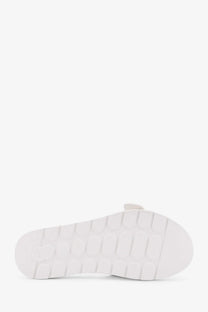 White rubber sole with textured grid pattern on tory burch women’s patent synthetic leather buckle slide white