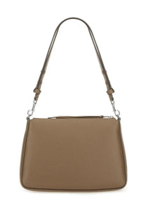 Tory Burch women’s perry shoulder bag in tan leather with sleek minimalist design and silver-toned hardware