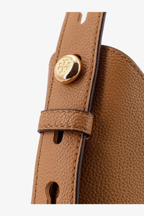 Tan pebbled leather strap with gold-tone circular button featuring Tory Burch logo on Tory Burch Romy Hobo bag brown