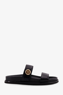 Tory burch women’s romy black leather slide sandal with gold-toned circular logo buckle on top