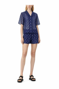 Navy blue sheer button-down shirt and matching shorts set with subtle white paisley pattern tory burch women’s shorts camp blue