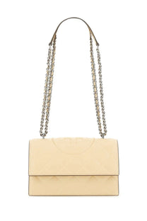 Cream-colored leather Tory Burch Fleming small crossbody bag with quilted flap and silver-toned chain strap