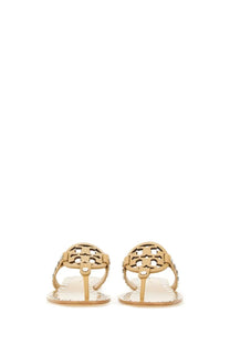 Tory Burch women’s beige studded miller sandal with gold-tone metal thong straps and interlocking logo perforation