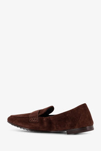 Tory Burch women’s black suede loafers with classic slip-on design and small rectangular buckle detail