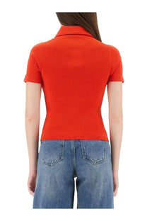 Tory Burch women’s vibrant orange ribbed knit viscose polo shirt with classic collar and short sleeves