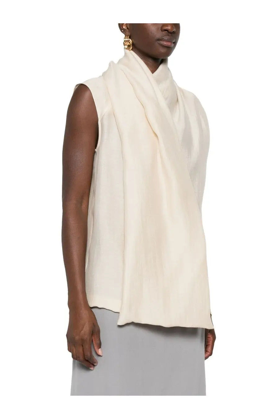 Toteme women’s blouse pink styled as a cream-colored silk scarf worn as a sleeveless top