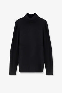 Toteme women’s cashmere turtleneck sweater in black with a smooth minimalist design