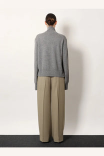 Toteme women’s cashmere grey turtleneck sweater with a subtle textured knit pattern for cozy layering