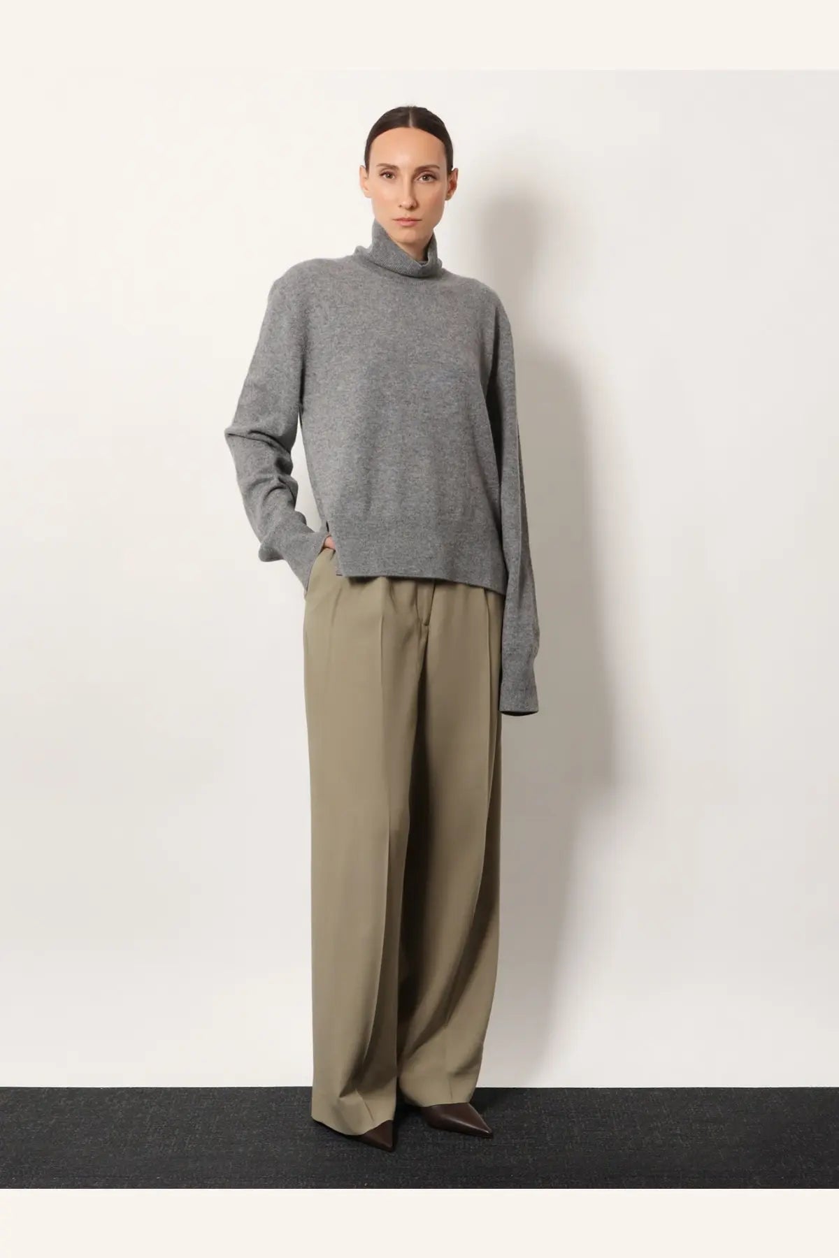 Toteme women’s cashmere turtleneck sweater in soft heather gray with relaxed fit and subtle texture