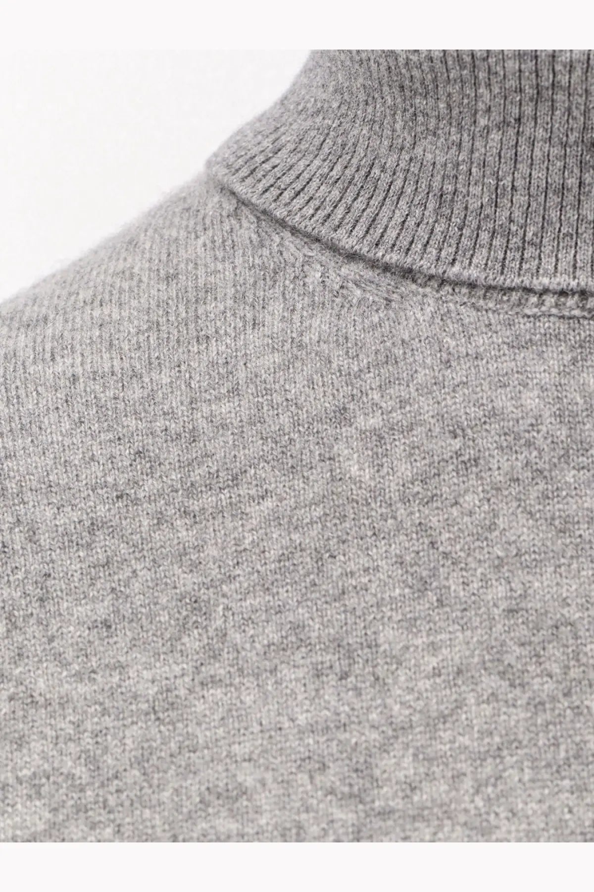 Toteme women’s cashmere turtleneck sweater grey with ribbed collar and fine knit texture in soft heather gray