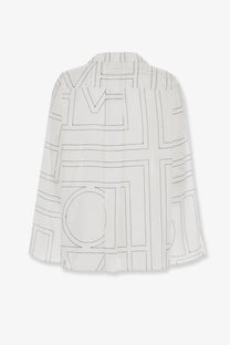 Toteme women’s cotton blend black pajama top with white blouse style and black geometric line pattern