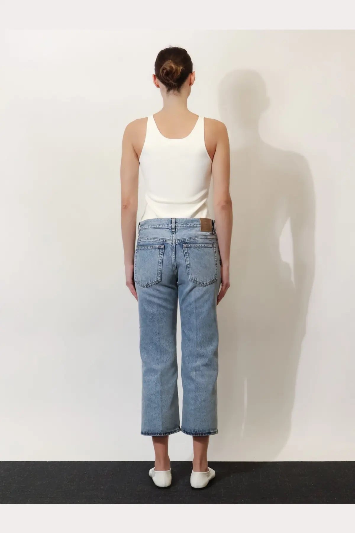 Toteme women’s cotton jeans in grey light-wash denim with straight-leg cut and rolled cuffs