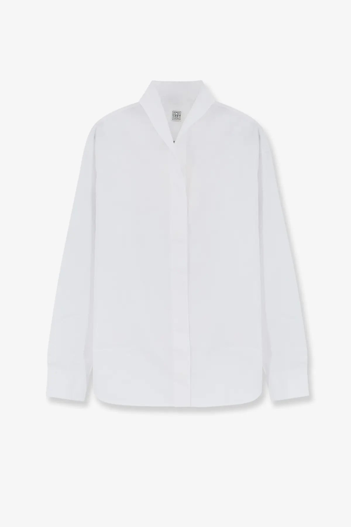 Toteme women’s white cotton shirt with minimalist button-up design and subtle texture for modern style