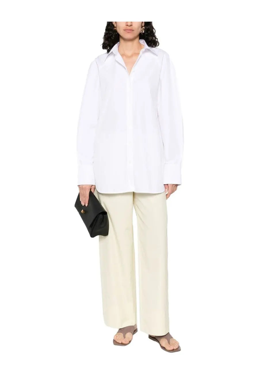 White oversized cotton button-down shirt with long sleeves and classic collar by Toteme for women