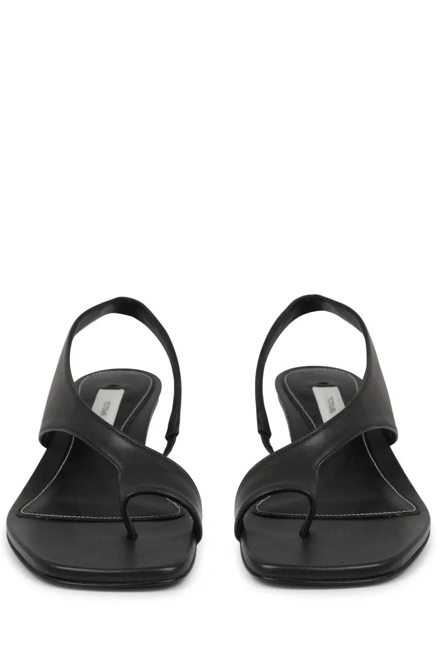 Toteme women’s black leather thong sandals with minimalist design and subtle white stitching along the edges