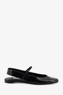 Toteme women’s black leather mary jane flat shoe with sleek minimalist design and small buckle strap