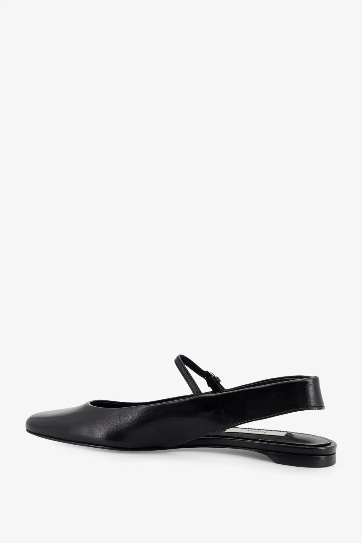 Toteme women’s black leather slingback flat shoe with minimalist design and low heel shown from the back