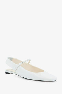 Toteme women’s white patent leather mary jane flats with sleek minimalist design and small silver buckle