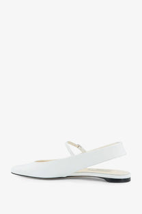 Toteme women’s white leather ballet flats with sleek satin mary jane design and black sole front view