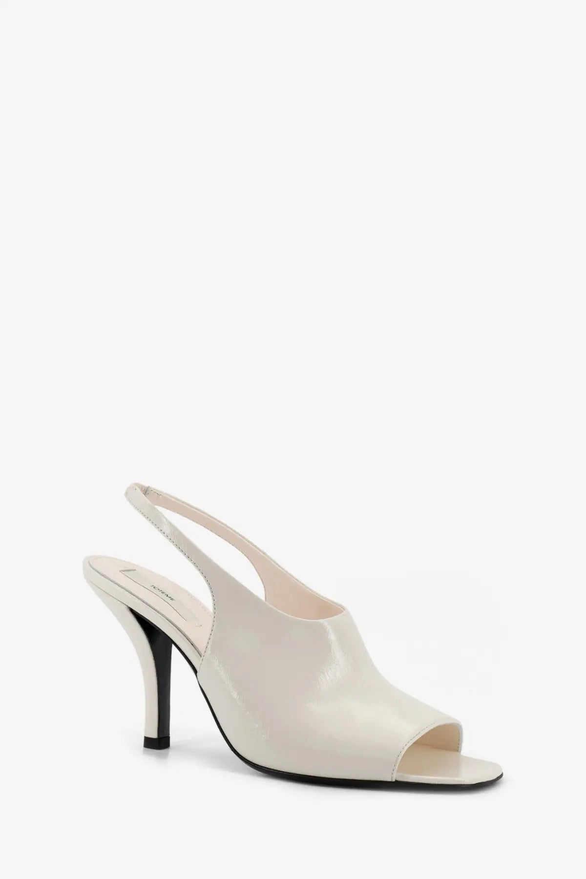Toteme women’s white cream-colored patent leather slingback heel sandal with sleek minimalist design and black sole