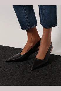 Toteme women’s leather écolleté slingbacks in black with pointed toes and a sleek minimalist design