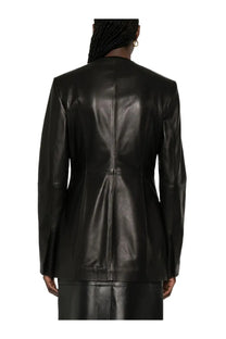 Toteme women’s black leather blazer with a sleek structured design and subtle sheen