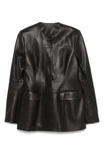 Toteme women’s black leather jacket with sleek minimalist design and two front flap pockets